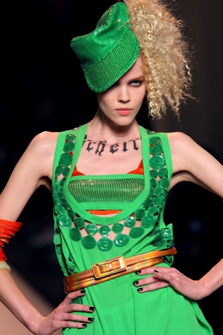 Illustration for article titled Jean-Paul Gaultier: Brights, Bras, Bellies, And Braids